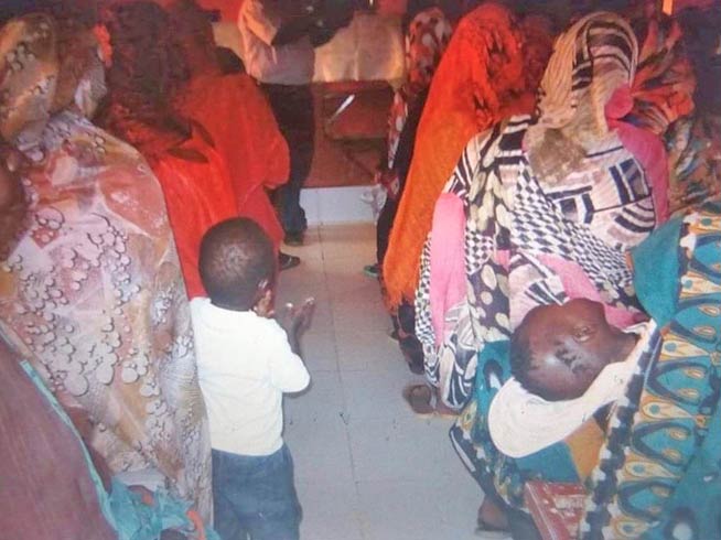 Sudanese Christian women, imprisoned under sharia law, worshipping with their children in jail. Barnabas Fund supports a prison ministry that has helped more than 1,200 women and 150 children